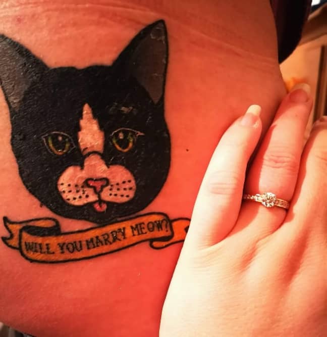 The tat read 'Will you marry meow?'. Credit: LADbible