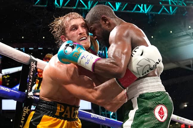 Logan Paul, left, and Floyd Mayweather fight during an exhibition boxing match. Credit: PA