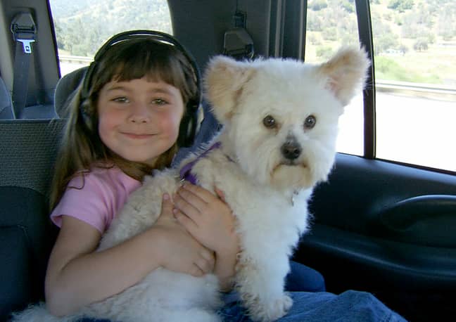 Gizmo with Kira when she was four. Credit: Kennedy News and Media