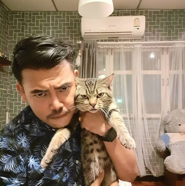 Lomphonten and his cat, Achi. Credit: Facebook/Lomphonten Lomphontan