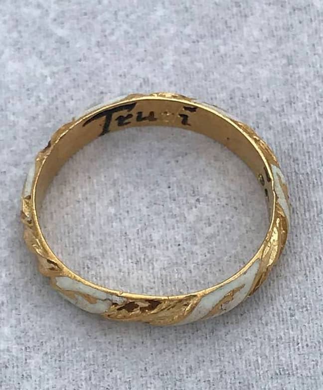 The ring is inscribed with the words 'Truth Betrayes Not'. Credit: BNPS