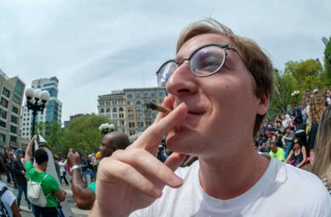 A Man Smoking Marijuana. Credit: PA