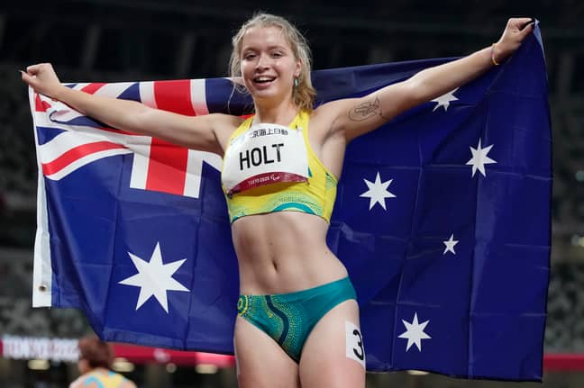 Australia's Isis Holt celebrate after winning the silver medal at the women's 200m T35. Credit: PA