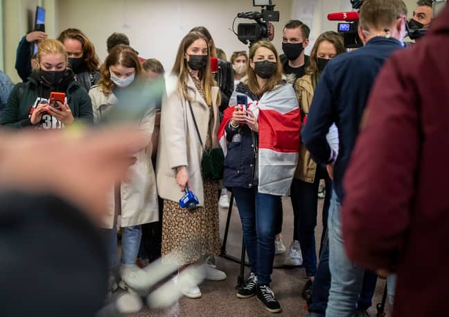 Journalists and activists gather at International Airport outside Vilnius, Lithuania. Credit: PA