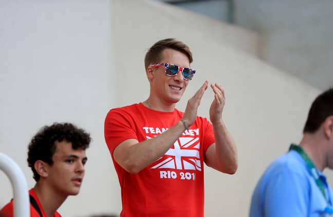 Tom Daley's husband, Dustin Lance Black, cheering Tom on at the Rio 2016 Olympics. (Credit: PA)