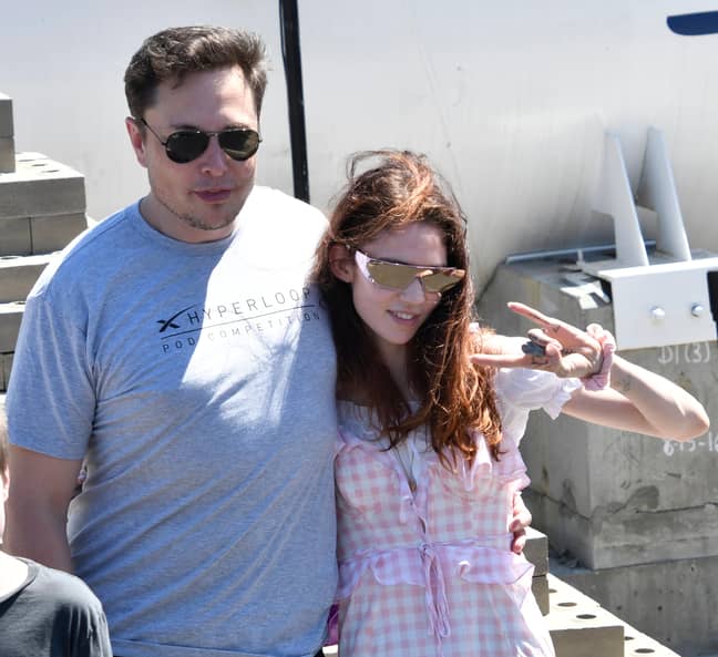 Elon Musk and Grimes in 2018. Credit: Alamy