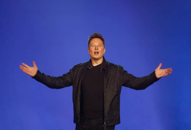 Elon Musk unveiling the car. Credit: PA