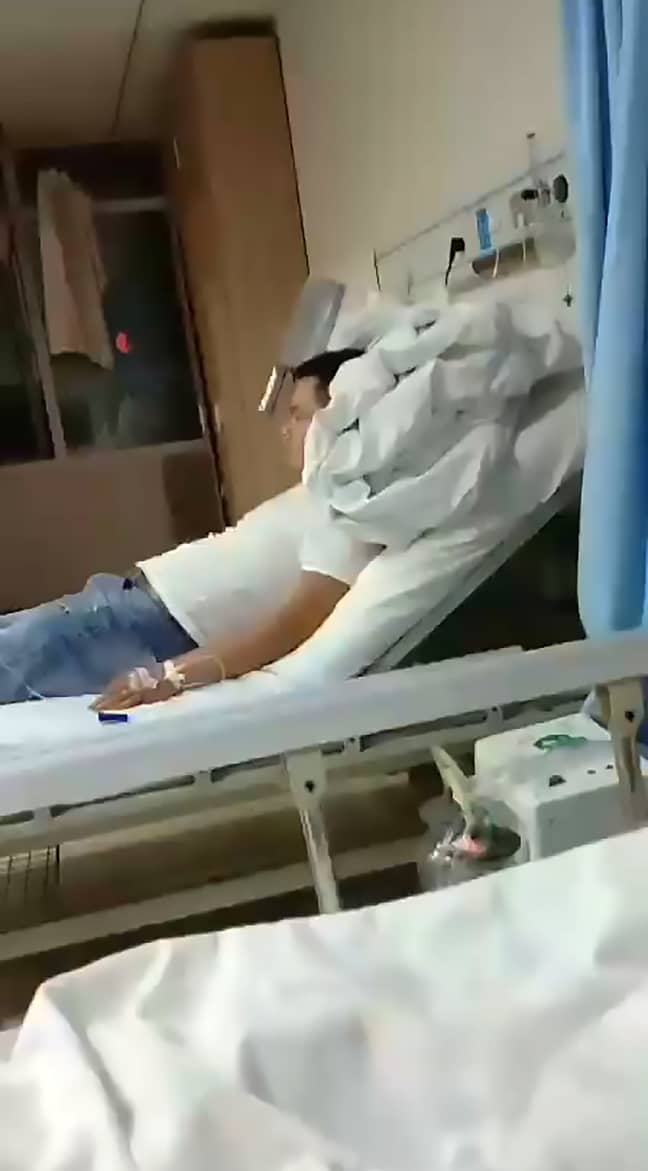 The man sat in a hospital bed. Credit: Asia Wire 
