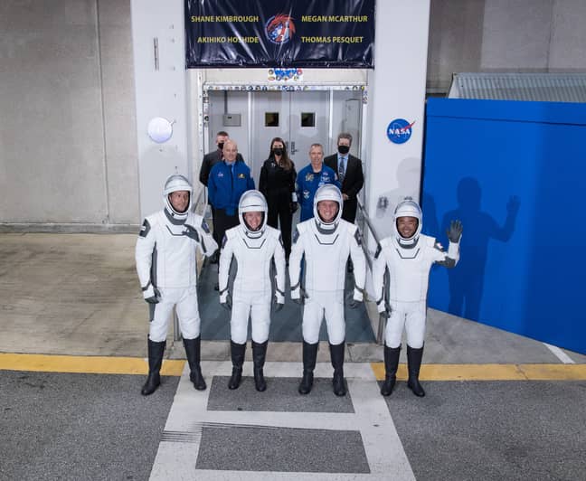 Astronauts prepare to board Elon Musk's Crew Dragon flight to the ISS in April 2021. (Credit: PA)