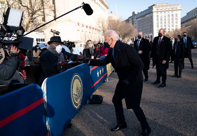 Joe Biden fist bumps journalist Al Roker. Credit: PA
