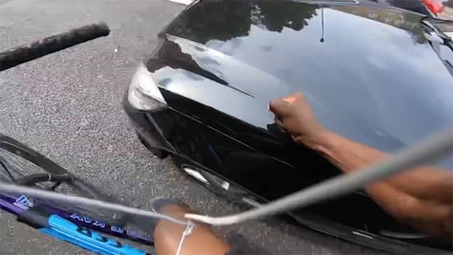 The cyclists banged on the bonnet of the driver's car. Credit: YouTube