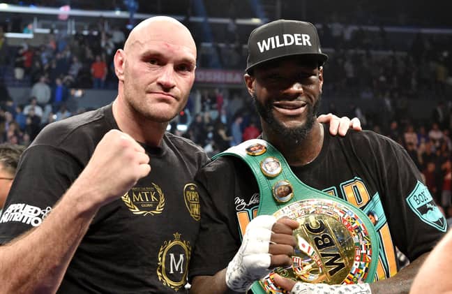 Tyson Fury and Deontay Wilder. Credit: PA