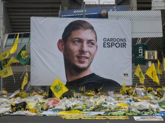 Wreaths and flowers in memory of Emiliano Sala, in front of the Beaujoire Stadium in Nantes. Credit: PA