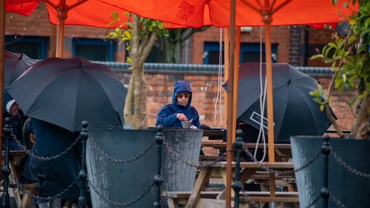 Brits Still Braving Beer Gardens Despite Torrential Rain