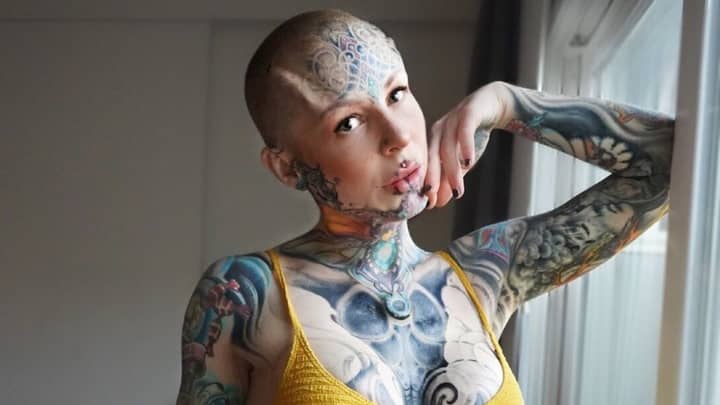 Tattooed Model Gets 3D Silicone Forehead Implants Under Her Skin 
