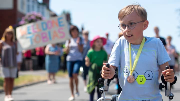 Boy With Cerebral Palsy Raises £80,000 For Charity With 'Captain Tom' Marathon