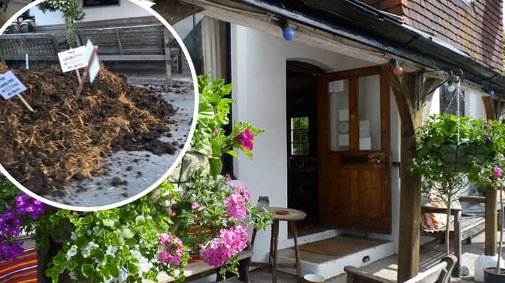 Huge Pile Of Manure Dumped Outside Pub With Sign Saying: "Landlord Is F***ing My Wife"