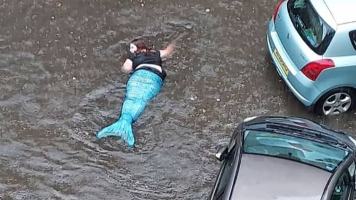 'Mermaid' Spotted Swimming In Flooded Street