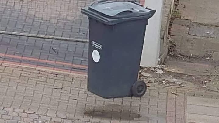 The Photo Of A Floating Wheelie Bin' Has People Scratching Their Heads
