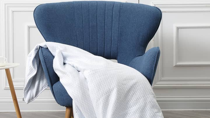 A Cooling Blanket Is Here For The Hot Sleepers Among Us