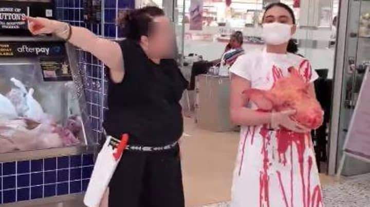 Butcher Faces Off Against Vegan Activist Holding Pig's Head In Shopping Centre