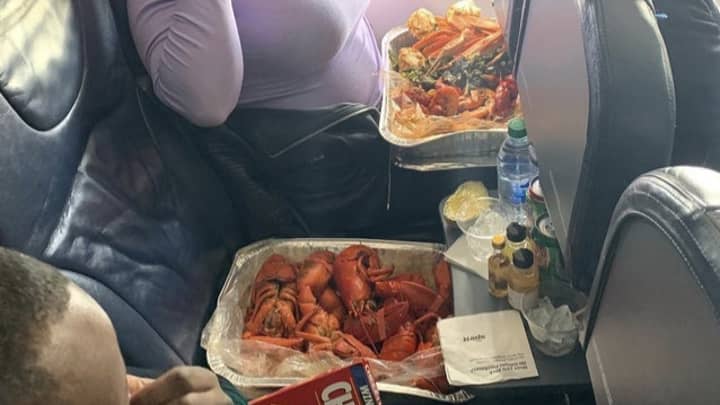 Woman Divides Opinion Over Her Humungous Meal During A Flight