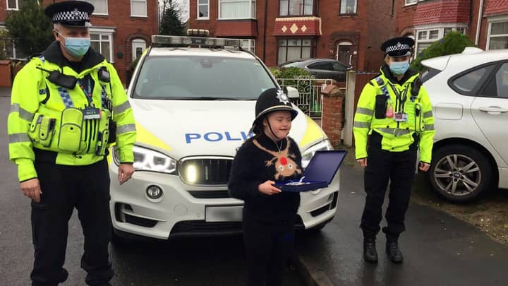 Police Swoop To 'Arrest' Girl With Down's Syndrome And Grant Christmas Wish