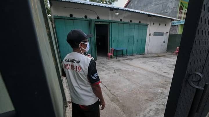 Coronavirus Quarantine Breakers Locked Away In 'Haunted Houses' In Indonesia