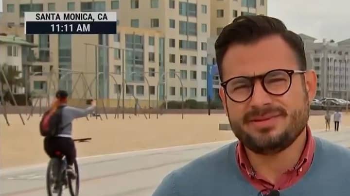 Cyclist's Disastrous Attempt At Selfie Is Caught On Live TV
