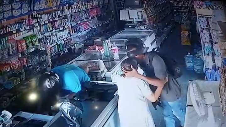 Armed Robber Refuses To Take Cash From Elderly Shopper And Kisses Her On The Head