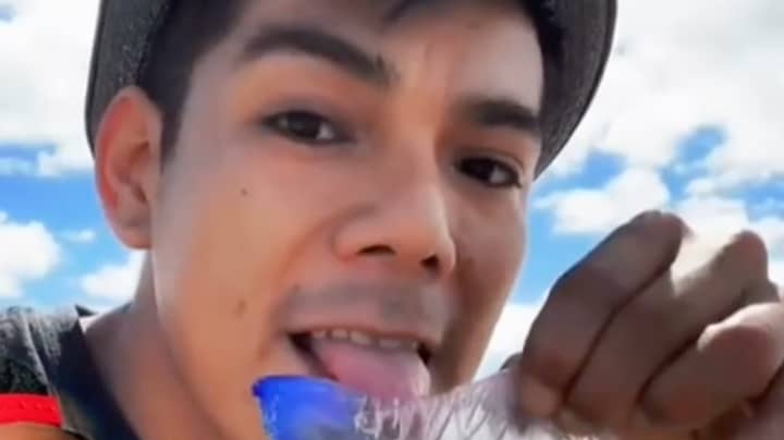 Man Licks Slimy Sea Creature He Finds On Beach For TikTok Video