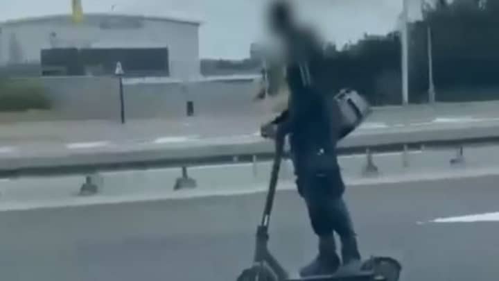 Scary Moment Guy Goes Down Dual Carriageway On E-Scooter