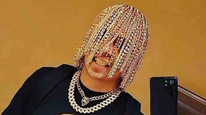 Rapper with gold chain hair