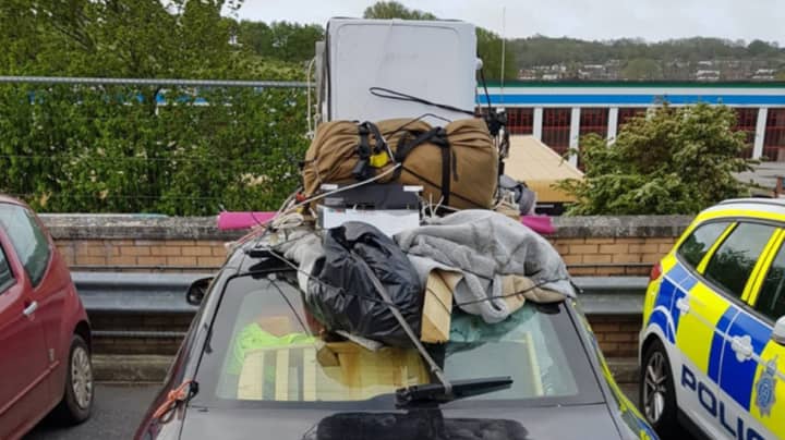 Police Stop 'Dangerous' Driver Who Crammed Car Full Of Junk
