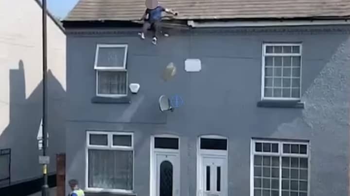 Shocking Moment Man Slips Off Roof 'Trying To Escape Police'