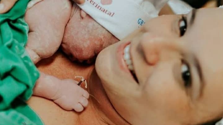 'Miracle' Newborn Baby Photographed Holding Mum's Coil