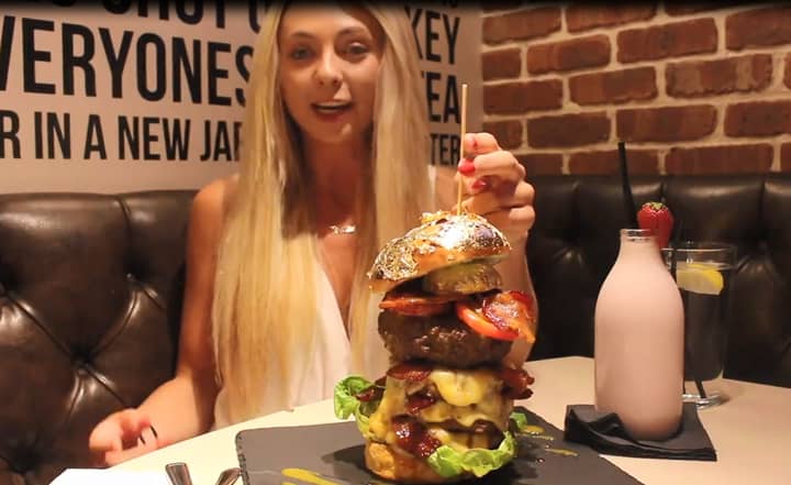 Watch This Woman Smash A 28 Ounce Burger Like It’s No Big Deal