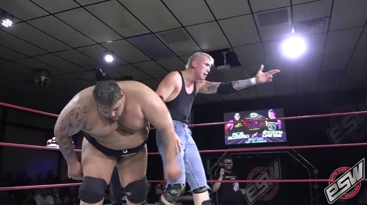 Fans Stunned As Wrestler Is Sent Hurtling Out Of The Ring 