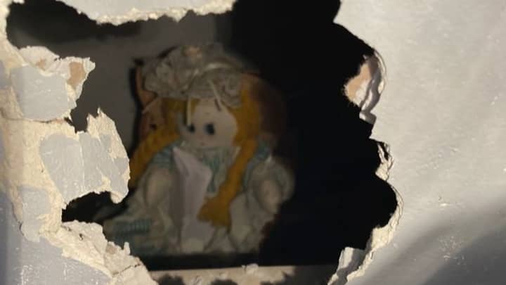 Homeowner Discovers Creepy Doll And Chilling Note Behind Wall In New Home