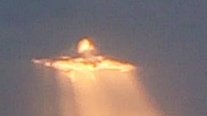 Man Spots Image Of Jesus Bursting Through Clouds