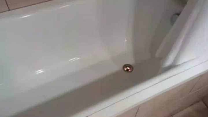 ​People Are Confused By A Weird Light Shining Through Hotel Bath Plughole
