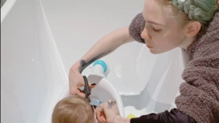 Grimes Gives Son X Æ A-12 A DIY Haircut That And Admits She's Not Sure It 'Went Well' 
