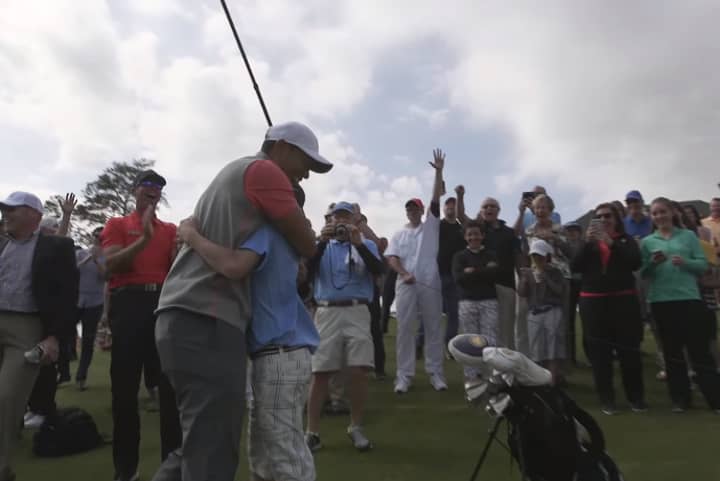 Tiger Woods Watches On As 11-Year-Old Hits A Hole In One At New Golf Course