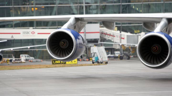 ​Two People Detained For Throwing Coins Into Plane Engine 'For Luck'