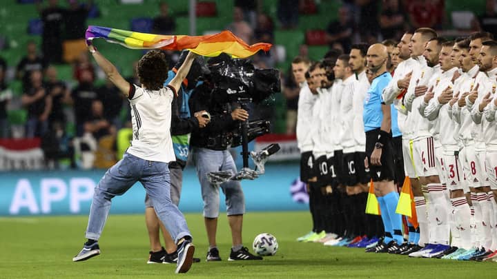 Pitch Invader Flies Pride Flag During Hungary National Anthem