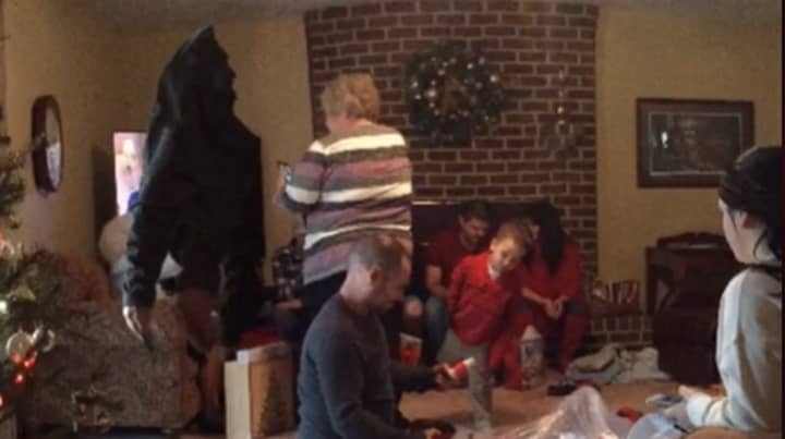 Woman Posts Video Showing 'Ghost' Watching Dad Open Christmas Presents