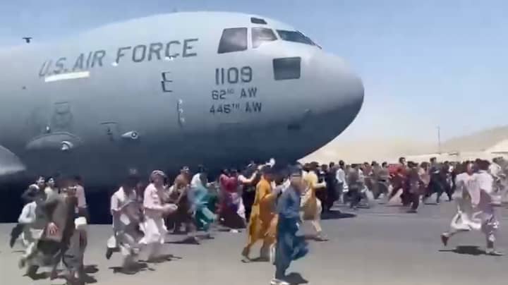 Afghan Locals Cling To Plane As It Takes Off In Kabul 