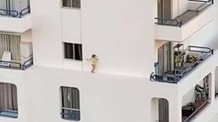 Shocking Video Shows Toddler Climbing Out Of A Hotel Window And Walking Across Ledge