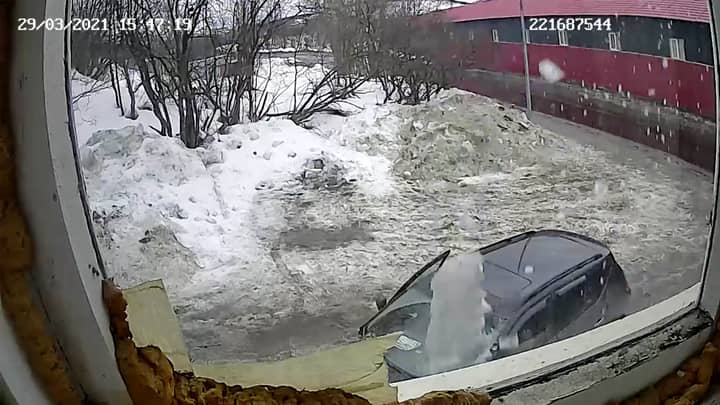 Miraculous Escape For Couple Sat In Parked Car As Ice Bomb Crashes Onto Windscreen
