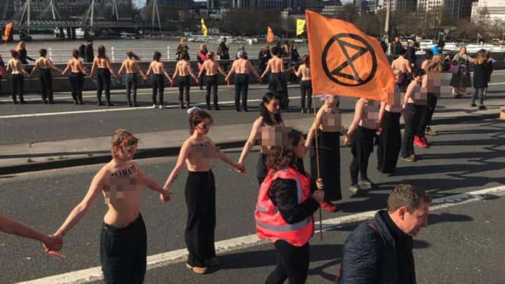 Topless Women Form Chain On Waterloo Bridge In Climate Change Protest